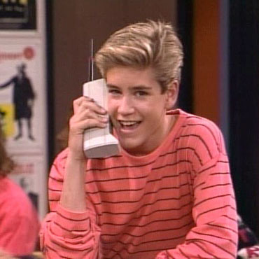 Zach Morris from Saved by the Bell, on his clunky cell phone